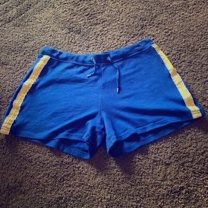 Blue cloth shorts with yellow stripe